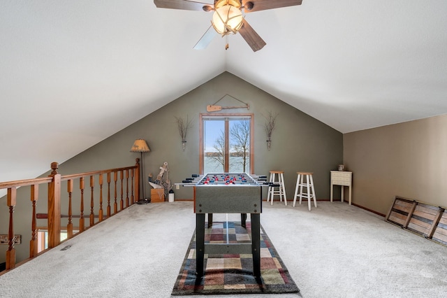 game room with carpet floors, lofted ceiling, and ceiling fan