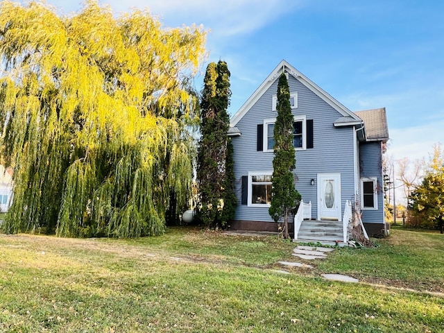 exterior space featuring a front lawn