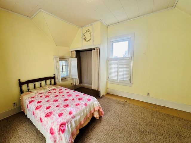 bedroom with vaulted ceiling