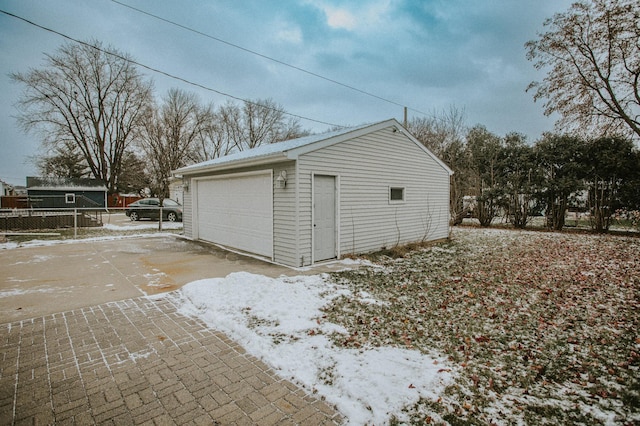 view of snow covered garage