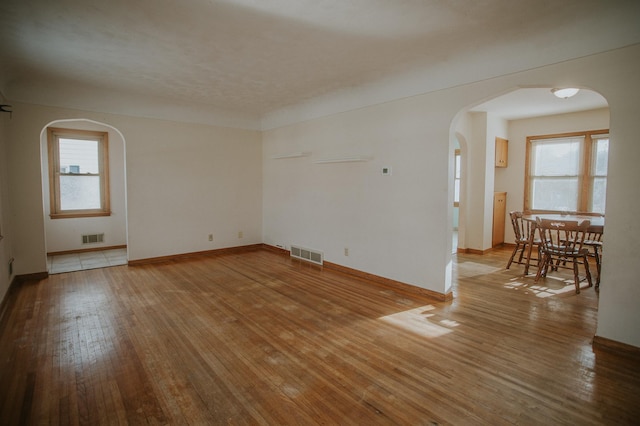 spare room featuring light hardwood / wood-style floors