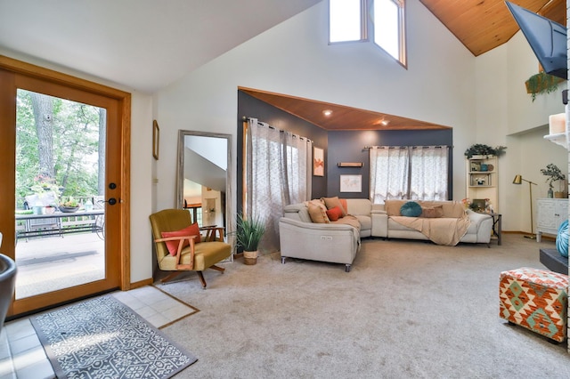 carpeted living area featuring high vaulted ceiling and a wealth of natural light