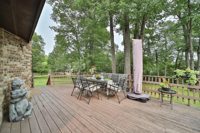 wooden deck with outdoor dining area
