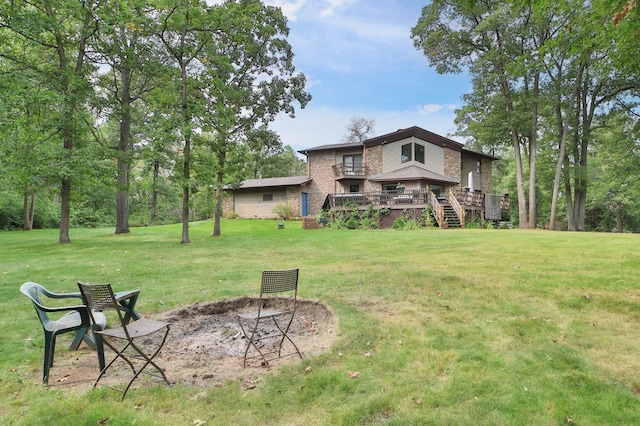 view of yard featuring a wooden deck