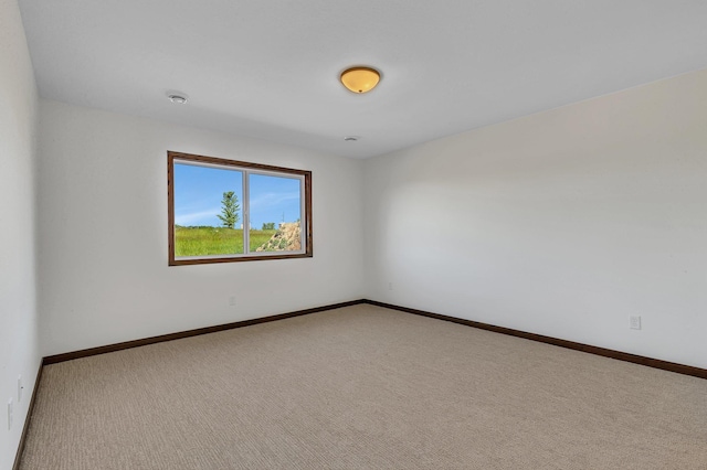 empty room with carpet flooring