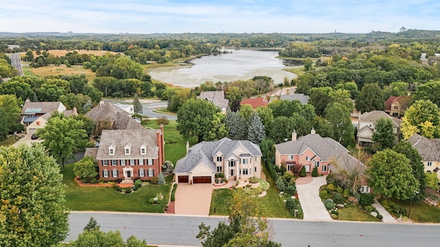 birds eye view of property featuring a water view