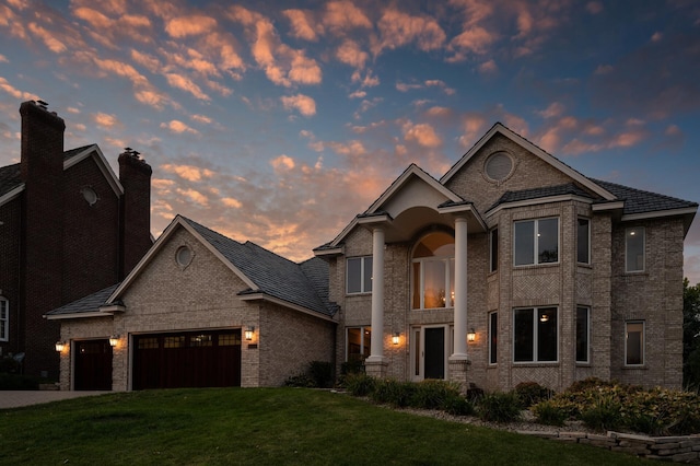 view of front of home with a yard