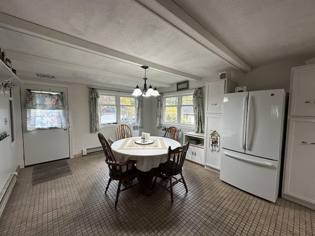 dining room featuring a notable chandelier, beam ceiling, a baseboard heating unit, and a textured ceiling