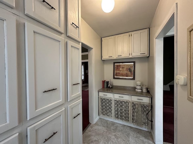 kitchen with white cabinets