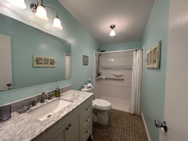 bathroom with tile patterned floors, a shower with shower curtain, vanity, and toilet