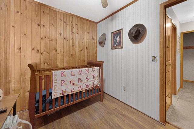 3234 14th Ave, Owatonna, MN 55060 - bedroom featuring wood finished floors, crown molding, and ceiling fan
