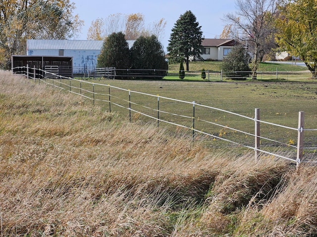 3234 14th Ave, Owatonna, MN 55060 - view of yard with a pole building, an outdoor structure, and a rural view