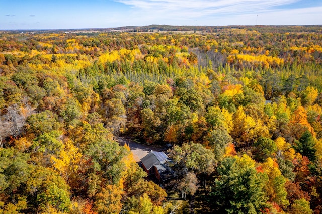 drone / aerial view with a view of trees