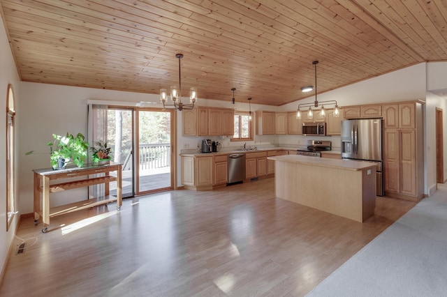 kitchen with stainless steel appliances, decorative light fixtures, light brown cabinetry, lofted ceiling, and a center island