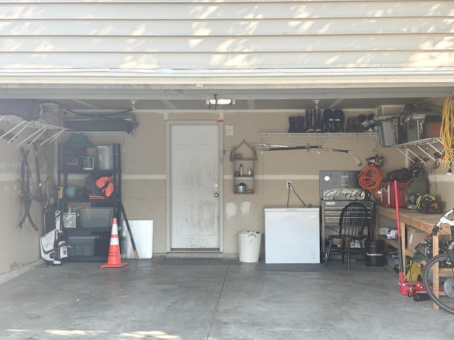 garage with white fridge