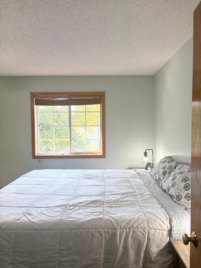 bedroom with a textured ceiling