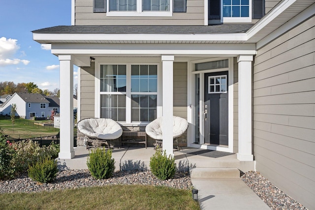 property entrance featuring a porch