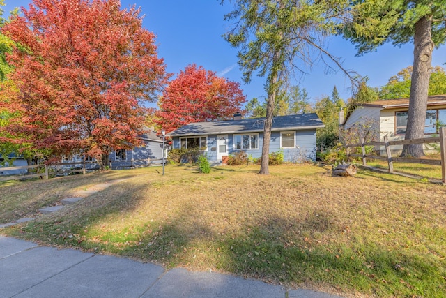 view of front of home with a front yard