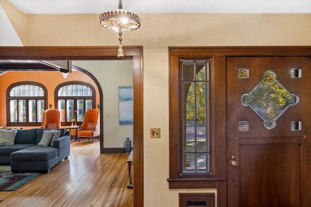 entryway with light hardwood / wood-style flooring and plenty of natural light