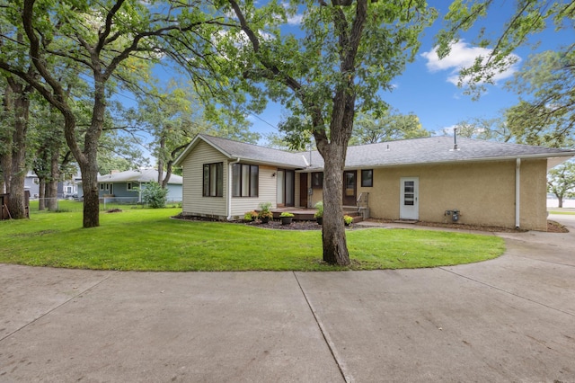 141 Lakeshore Dr, Big Lake, MN 55309 - ranch-style home with a front lawn and stucco siding
