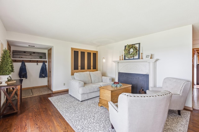 141 Lakeshore Dr, Big Lake, MN 55309 - living room with dark wood finished floors, a fireplace, and baseboards