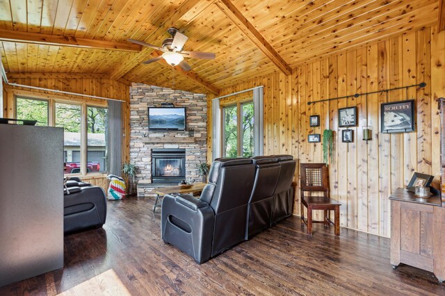141 Lakeshore Dr, Big Lake, MN 55309 - living area featuring a stone fireplace, wood finished floors, wood walls, wooden ceiling, and ceiling fan