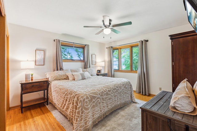 141 Lakeshore Dr, Big Lake, MN 55309 - bedroom featuring light wood-style floors and a ceiling fan