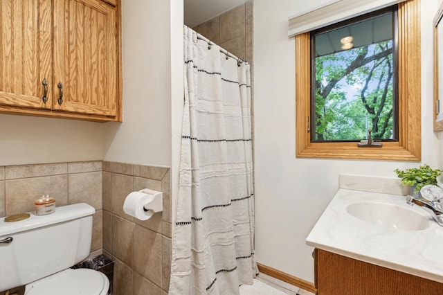 141 Lakeshore Dr, Big Lake, MN 55309 - bathroom with toilet, vanity, a shower with shower curtain, and tile walls