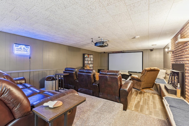 141 Lakeshore Dr, Big Lake, MN 55309 - cinema with a fireplace and wood finished floors