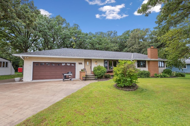 141 Lakeshore Dr, Big Lake, MN 55309 - ranch-style home with a chimney, a garage, driveway, and a front lawn