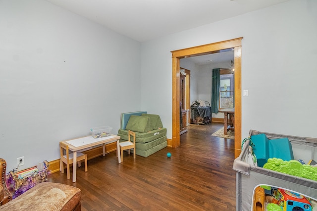 recreation room featuring dark hardwood / wood-style flooring