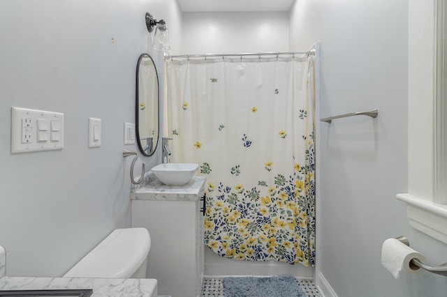 bathroom featuring vanity, a shower with curtain, toilet, and tile patterned flooring