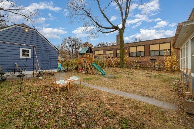 view of yard featuring a playground