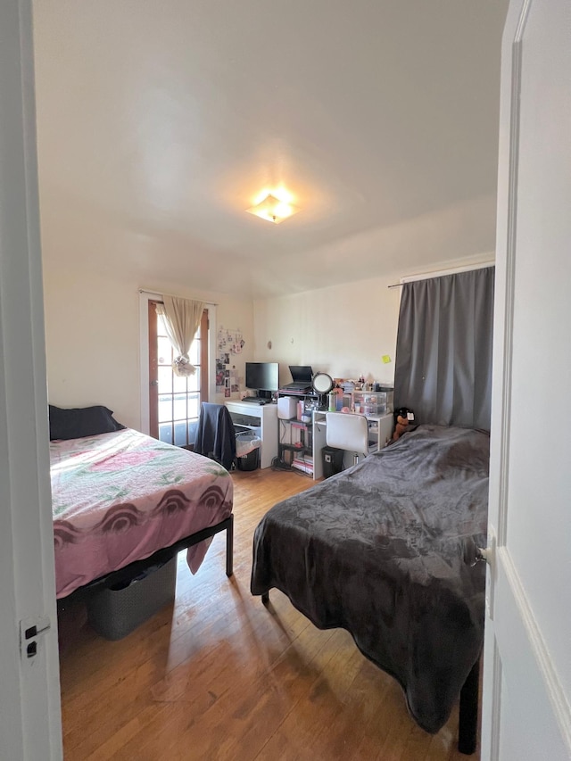 bedroom with light wood-type flooring