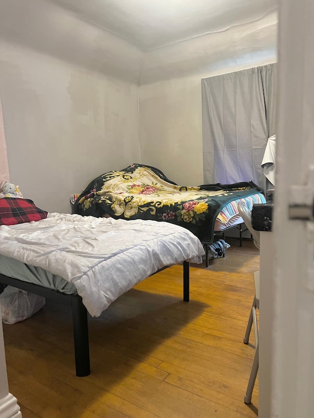 bedroom with light wood-type flooring