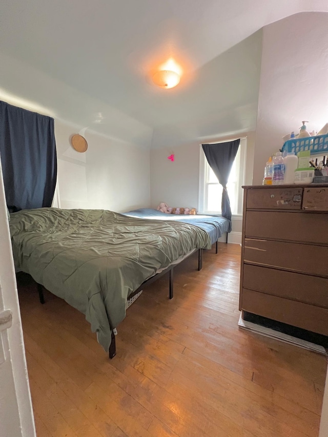 bedroom with light hardwood / wood-style floors