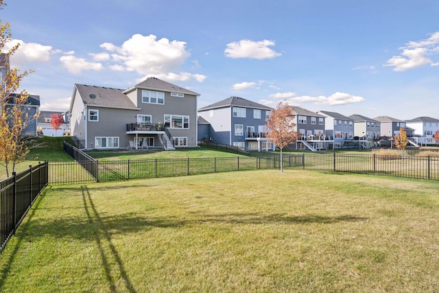 view of yard featuring a residential view and fence