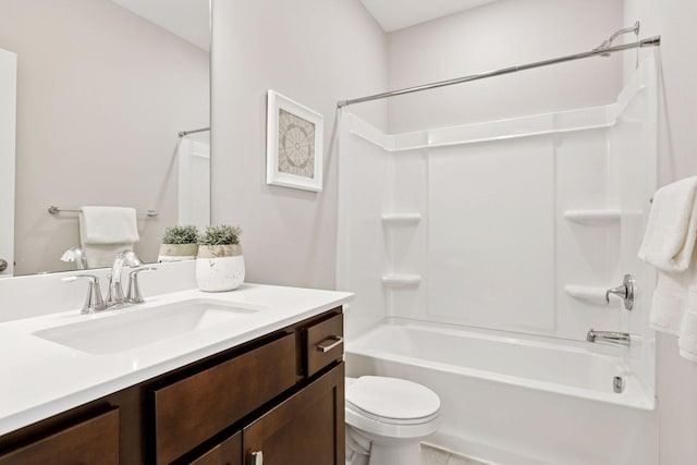 full bath featuring bathing tub / shower combination, vanity, and toilet