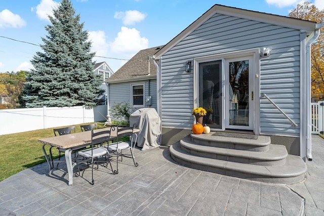 view of patio with a grill