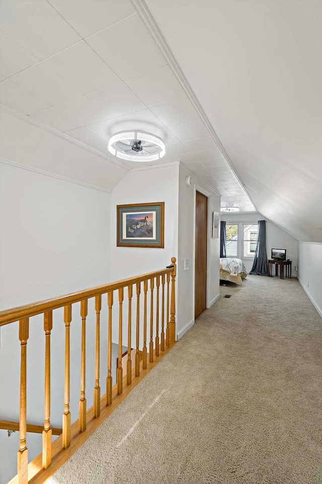 bonus room featuring vaulted ceiling, carpet flooring, and ceiling fan