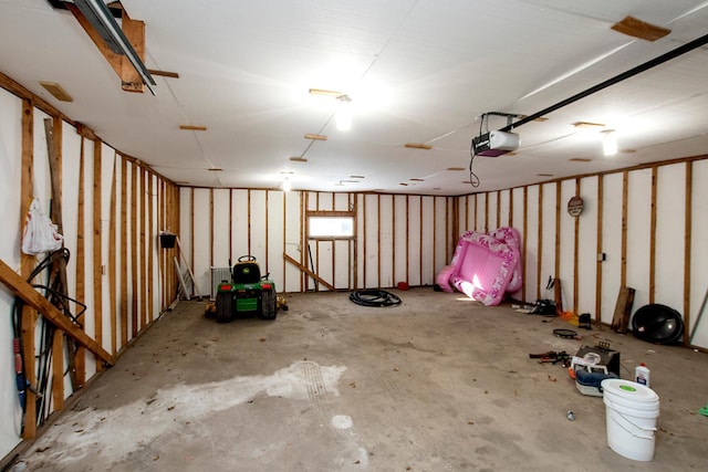 garage featuring a garage door opener