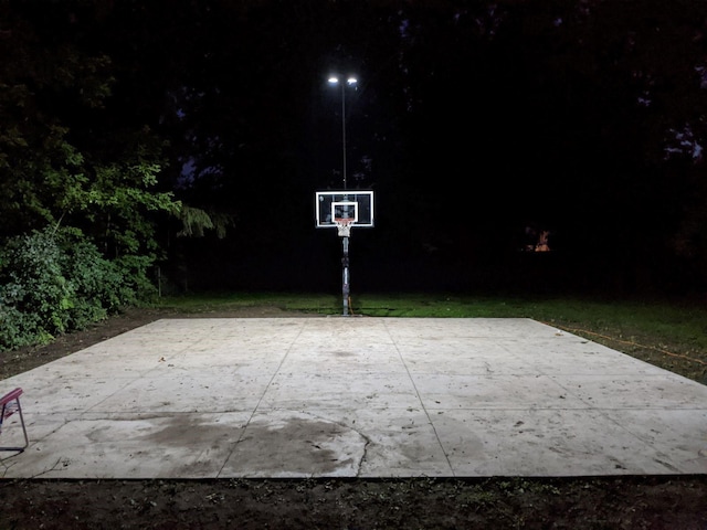 patio at night with basketball court