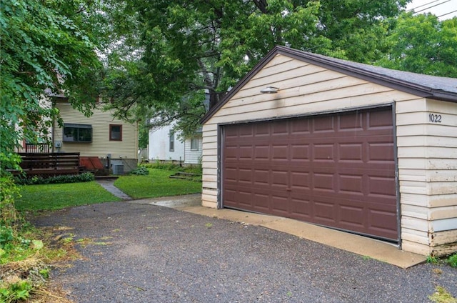 garage with a lawn