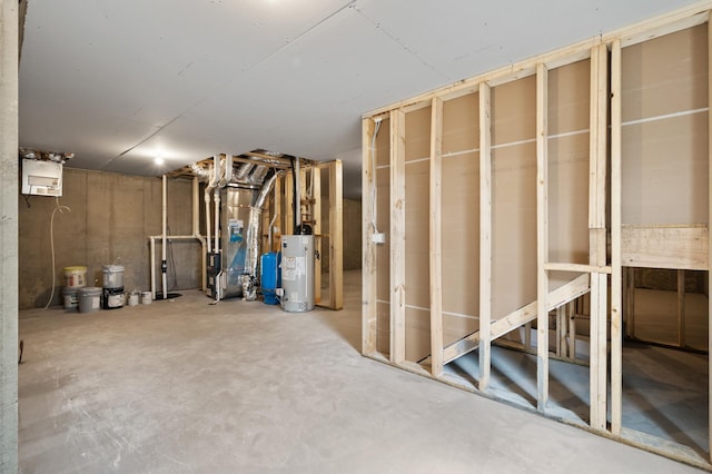 basement with gas water heater and heating unit