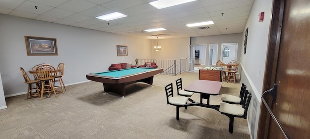 playroom with light carpet, a paneled ceiling, and pool table