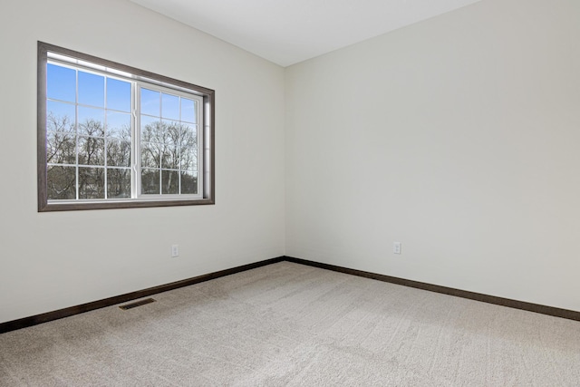 view of carpeted spare room