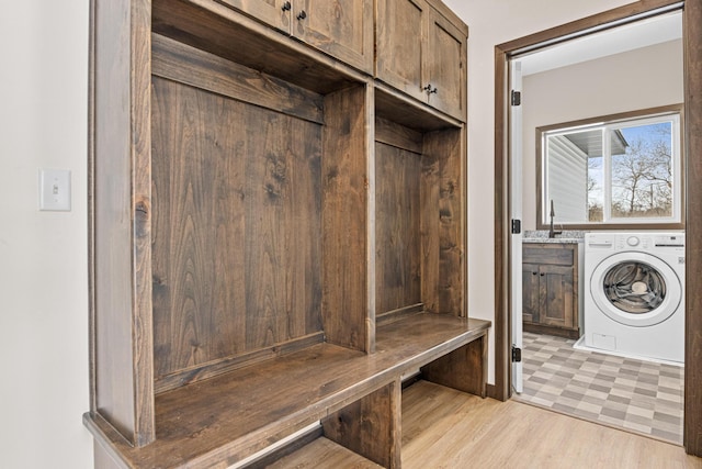 mudroom featuring washer / dryer and light wood-type flooring