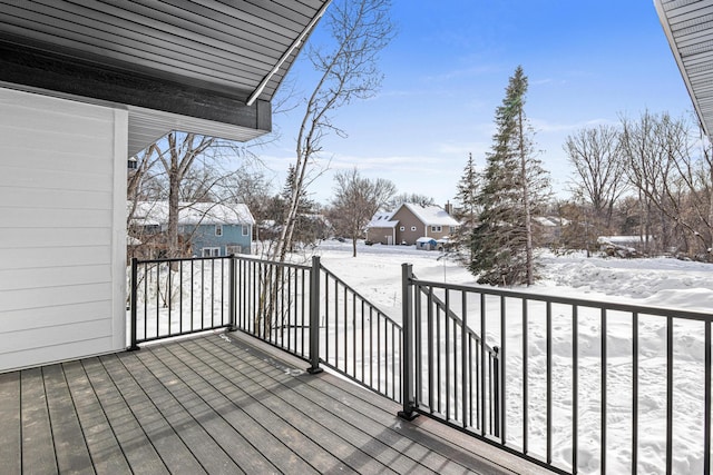 view of snow covered deck