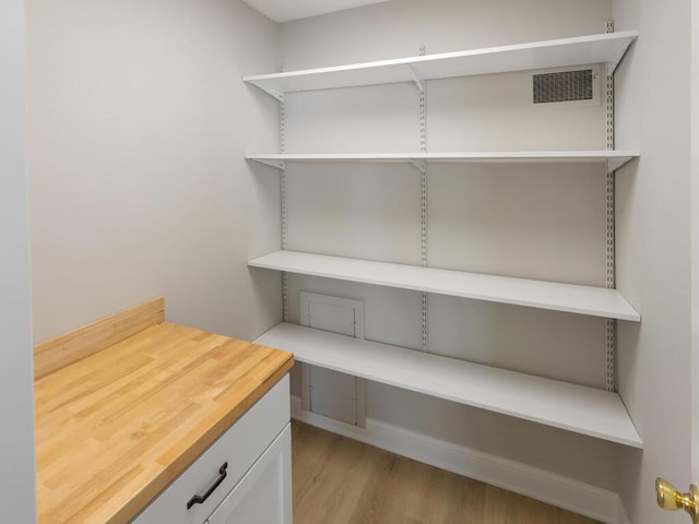 home office with light wood-type flooring