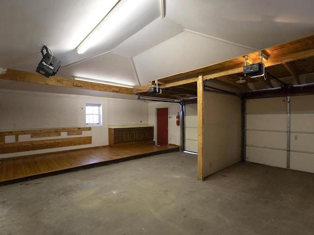 garage featuring a garage door opener